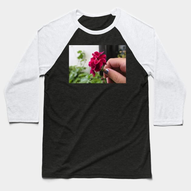 Hand with geranium flower Baseball T-Shirt by lightsfromspace